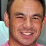 Simon after his dental implants and crowns done